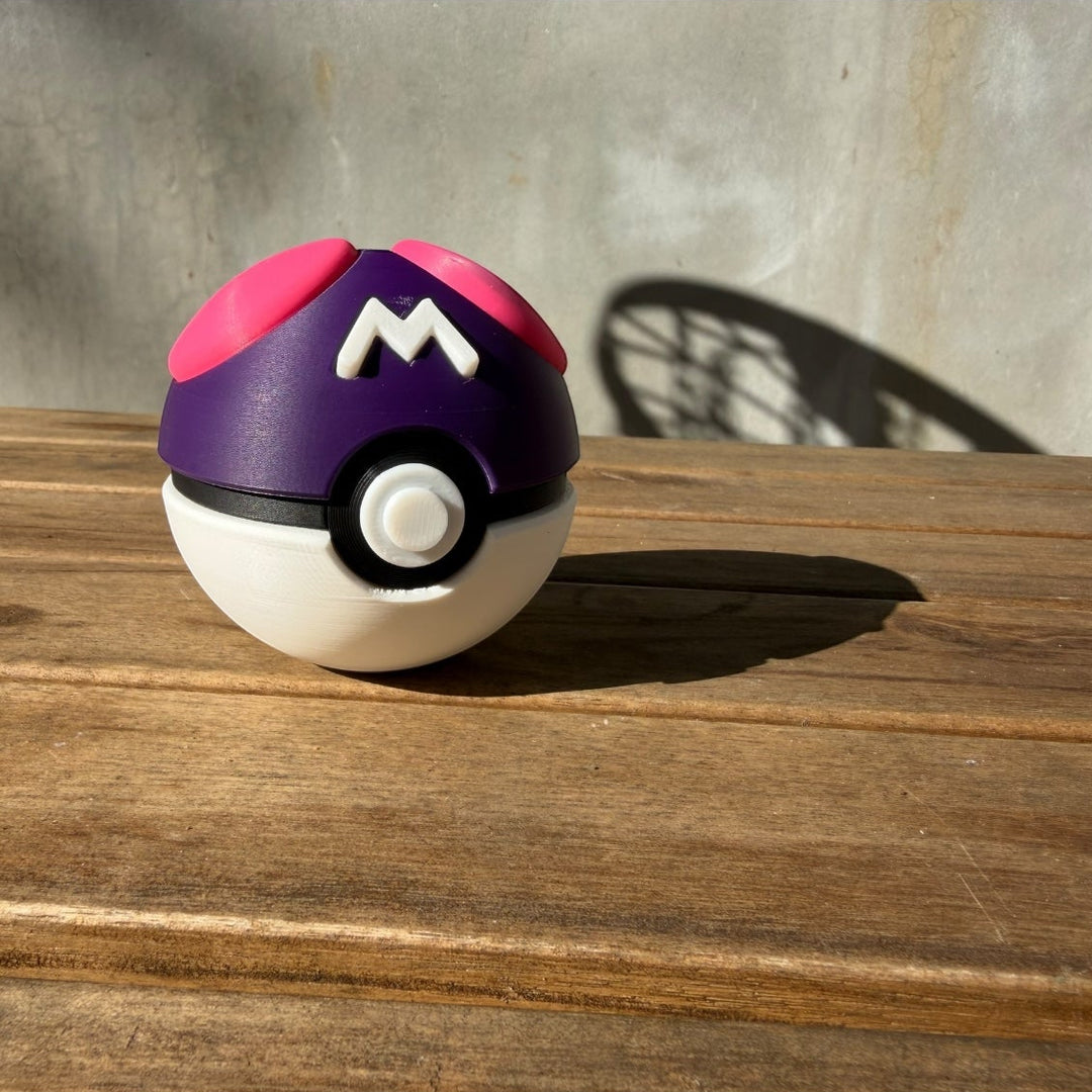 Purple and pink ball-like object with a white base on a wooden surface